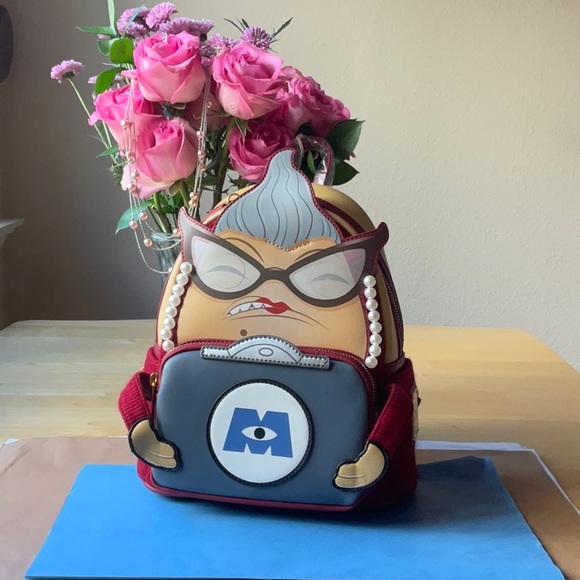 Loungefly Handbags - 🎒 LOUNGEFLY MONSTERS INC. ROZ MINI BACKPACK 🎒 NWT 🎒